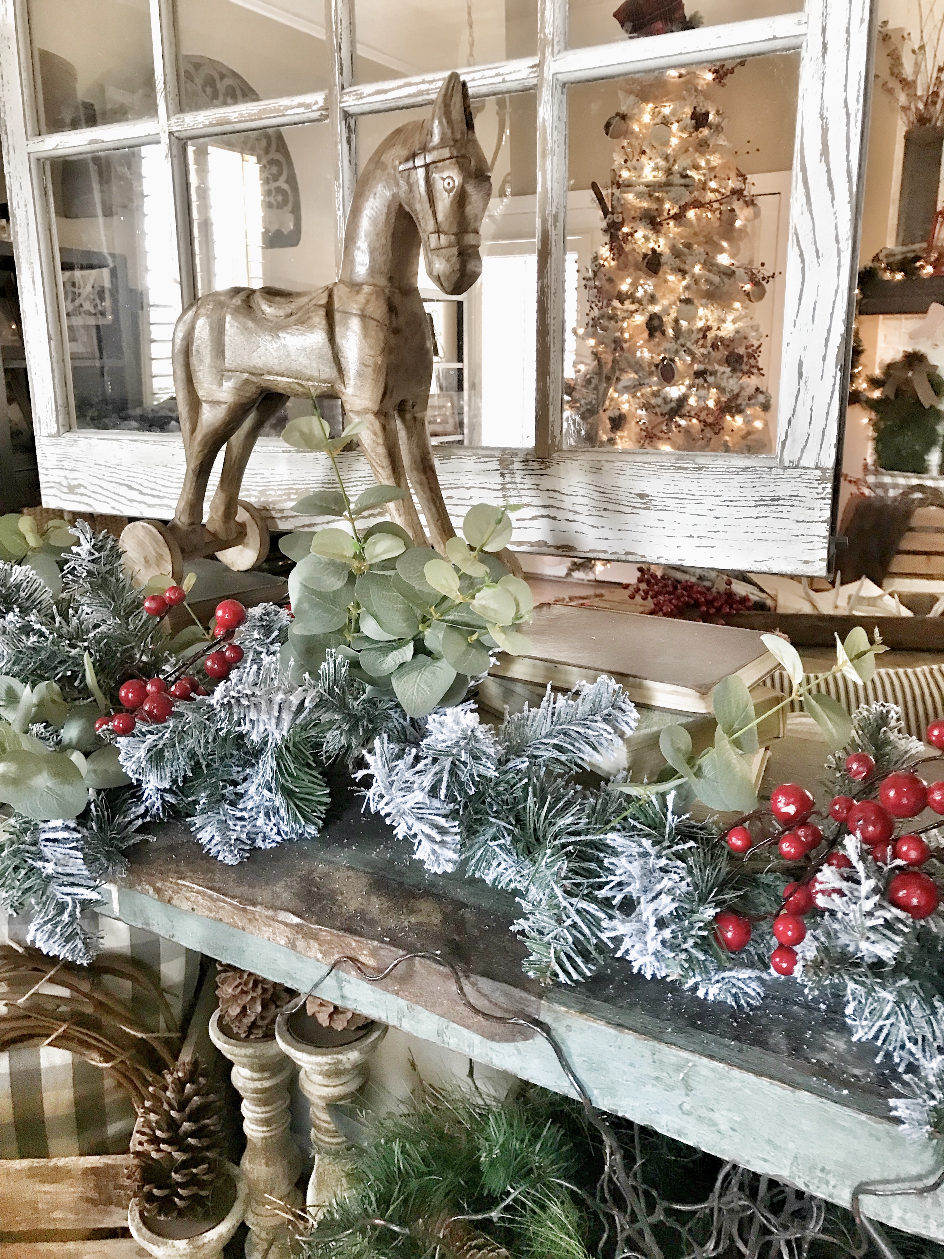 Christmas home tour flocked garland and wooden horse