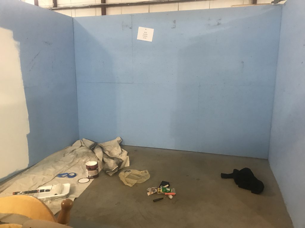 empty antique booth blue walls