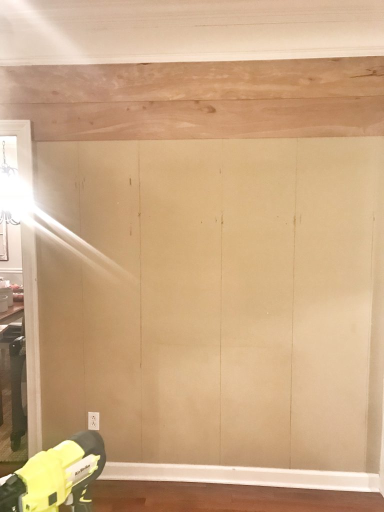 faux shiplap boards being hung